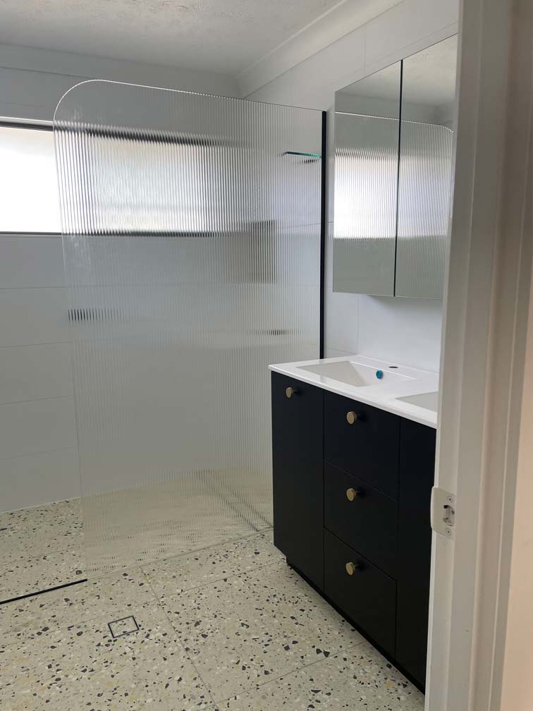 Frameless Narrow Reed Panel with Quad Shelf Shower Screen by DnD Glass South Tweed Heads
